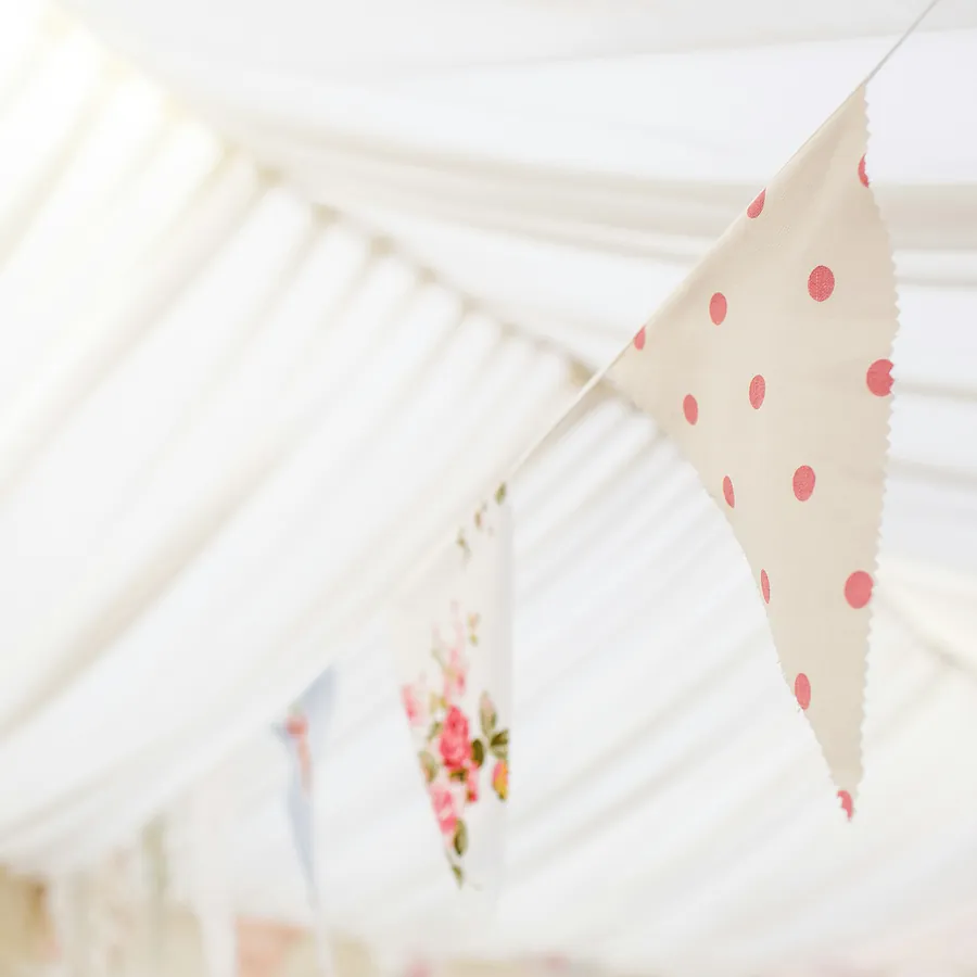 Bunting inside a white marquee